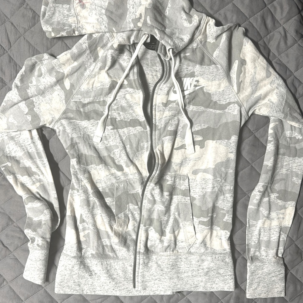 Women’s Nike size XS zip up sweatshirt.